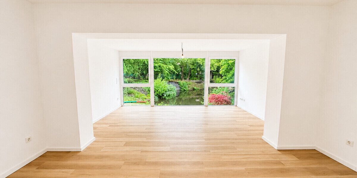 Exklusive kernsanierte Loftwohnung im Erstbezug mit Privatteich & Panorama-Glasfront - Erdgeschoßwohnung Münster / Albachten Albachten | Angebot:26621543